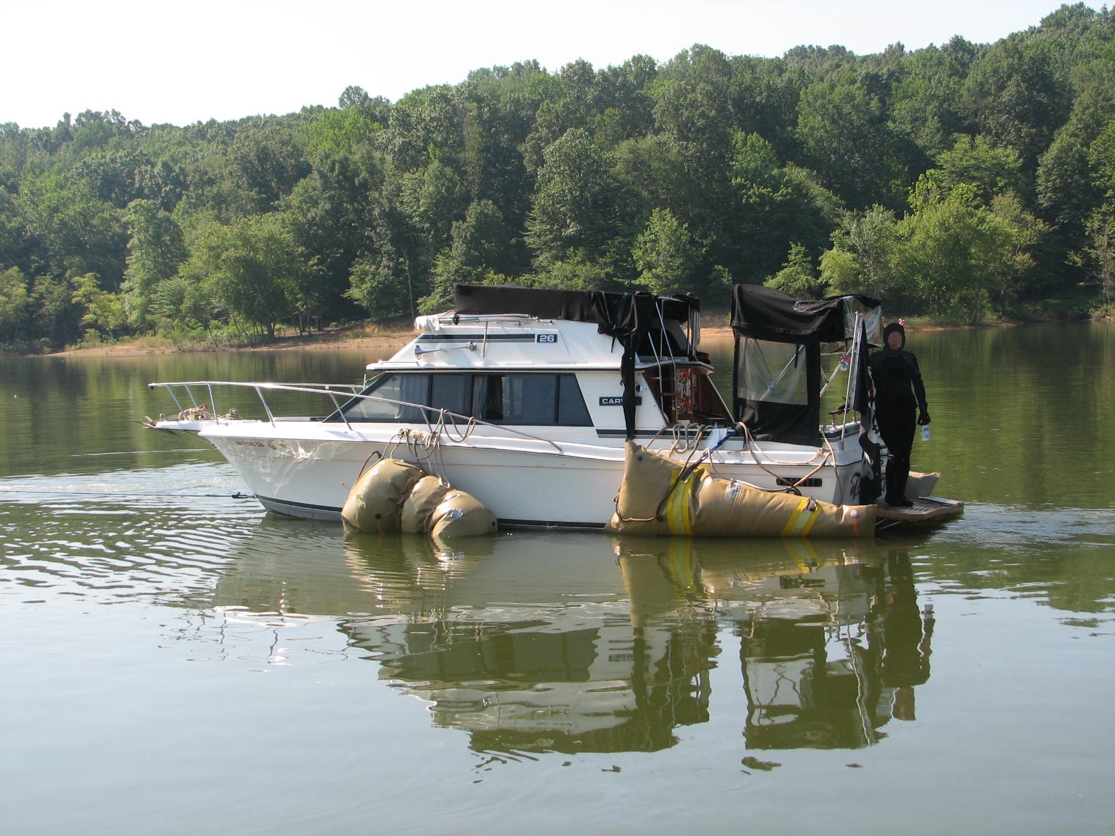Boat being towed to the boat ramp.